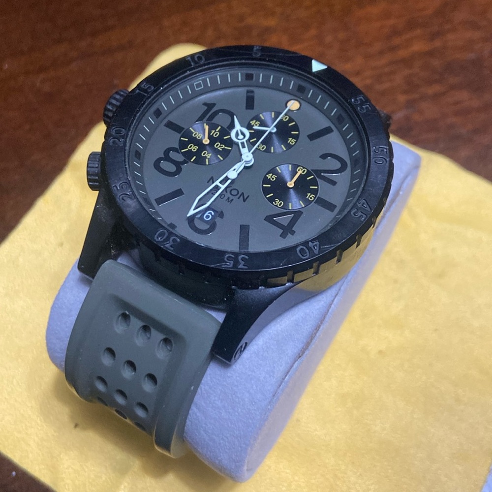 Nixon watch.
